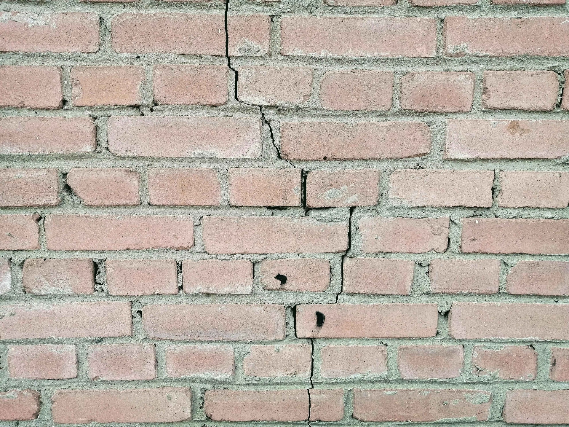 Cracked brick wall showing subsidence damage